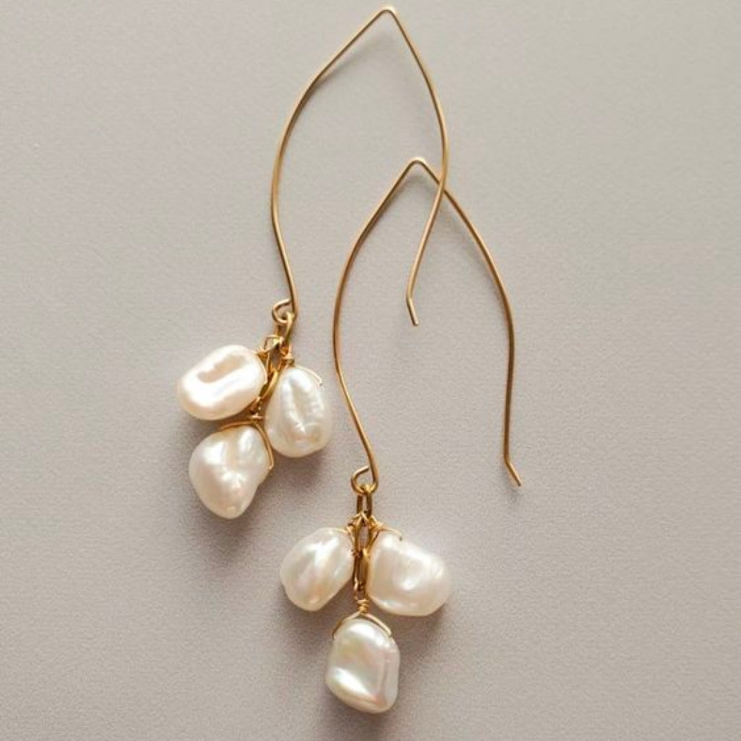 Vintage sarkan inci küpeler